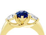 Yellow gold Three-Stone Marquise Cut Cut Diamond Ring with Trillion Side Stones and Four-Prong Setting_4