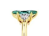 Yellow gold Three-Stone Marquise Cut Cut Diamond Ring with Trillion Side Stones and Four-Prong Setting_5