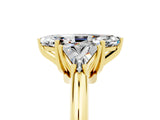 Yellow gold Three-Stone Marquise Cut Cut Diamond Ring with Trillion Side Stones and Four-Prong Setting_5