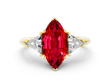 Yellow gold Three-Stone Marquise Cut Cut Diamond Ring with Trillion Side Stones and Four-Prong Setting