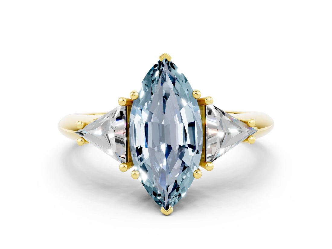 Yellow gold Three-Stone Marquise Cut Cut Diamond Ring with Trillion Side Stones and Four-Prong Setting