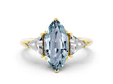 Yellow gold Three-Stone Marquise Cut Cut Diamond Ring with Trillion Side Stones and Four-Prong Setting
