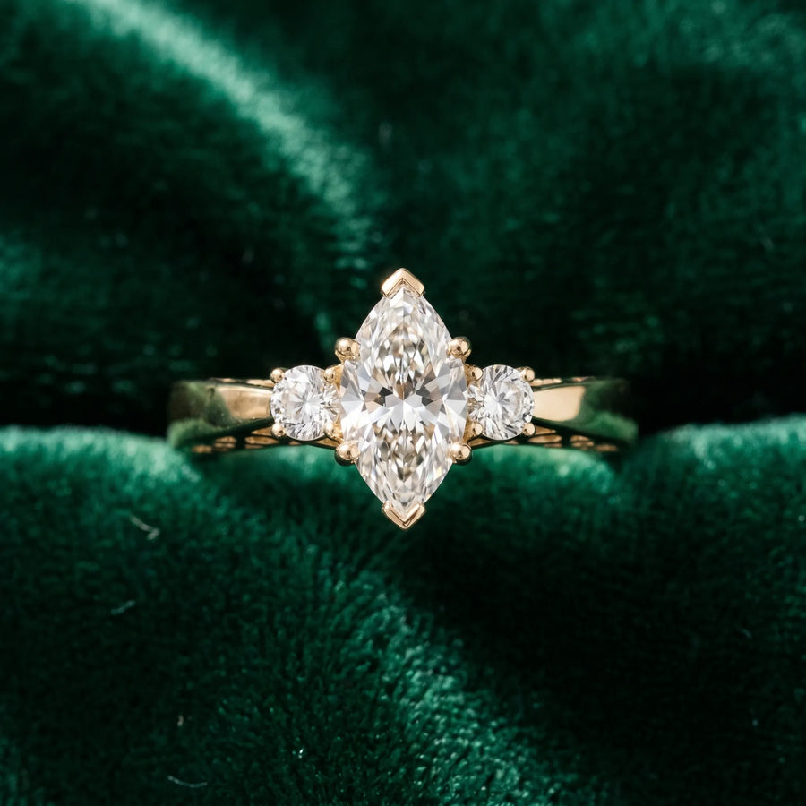 Yellow gold Three-Stone Marquise Cut Diamond Cathedral Engagement Ring with Prong Setting
