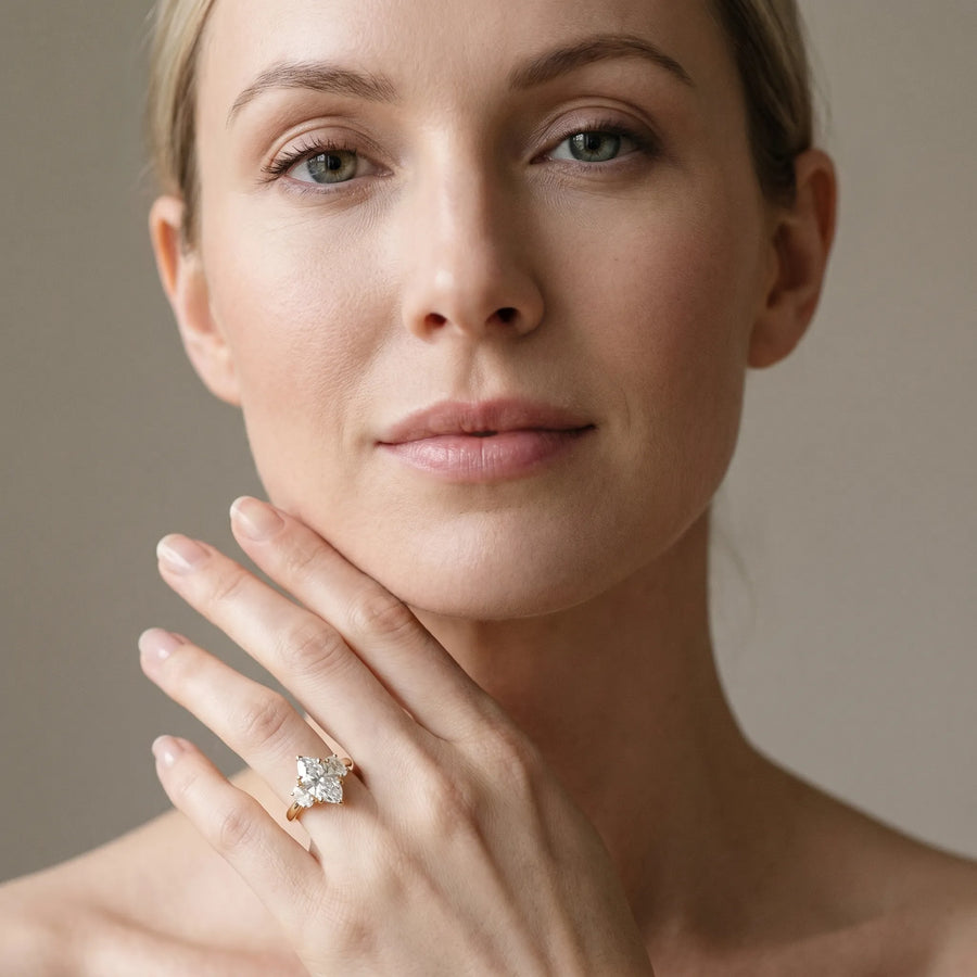 Yellow gold Three-Stone Marquise Cut Diamond Engagement Ring with Prong Setting on a White Gold Band