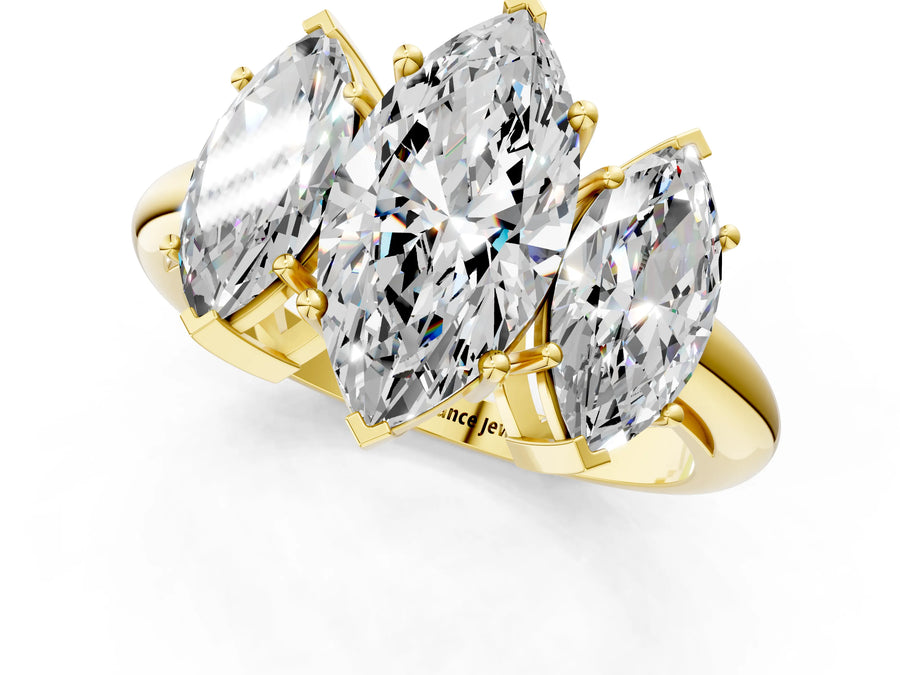 Yellow gold Three-Stone Marquise Cut Diamond Engagement Ring with Prong Setting on a White Gold Band
