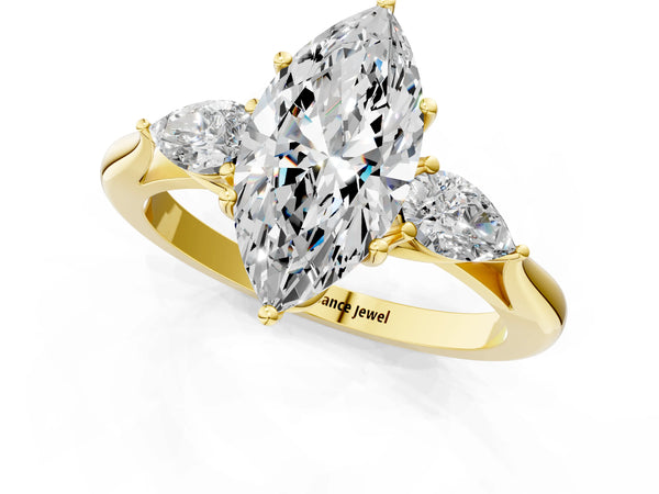 Yellow gold Three-Stone Marquise Cut Diamond Ring with Pear  Side Stones in Four-Prong Setting