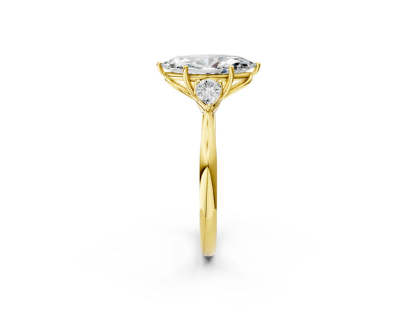 Yellow gold Three-Stone Marquise Cut Diamond Ring with Pear  Side Stones in Four-Prong Setting
