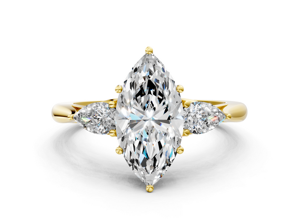 Yellow gold Three-Stone Marquise Cut Diamond Ring with Pear Side Stones in Four-Prong Setting