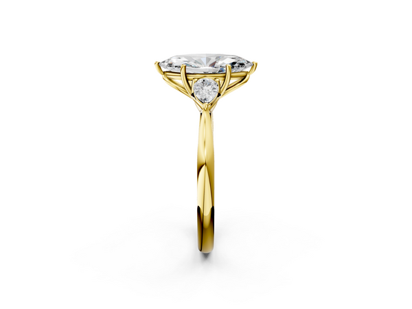 Yellow gold Three-Stone Marquise Cut Diamond Ring with Pear Side Stones in Four-Prong Setting