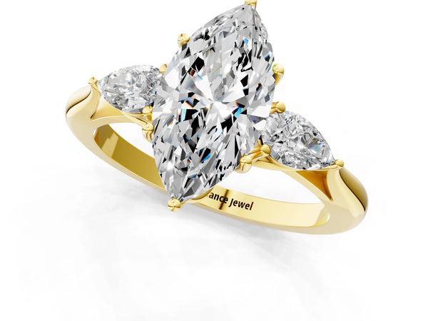 Yellow gold Three-Stone Marquise Cut Diamond Ring with Pear  Side Stones in Four-Prong Setting