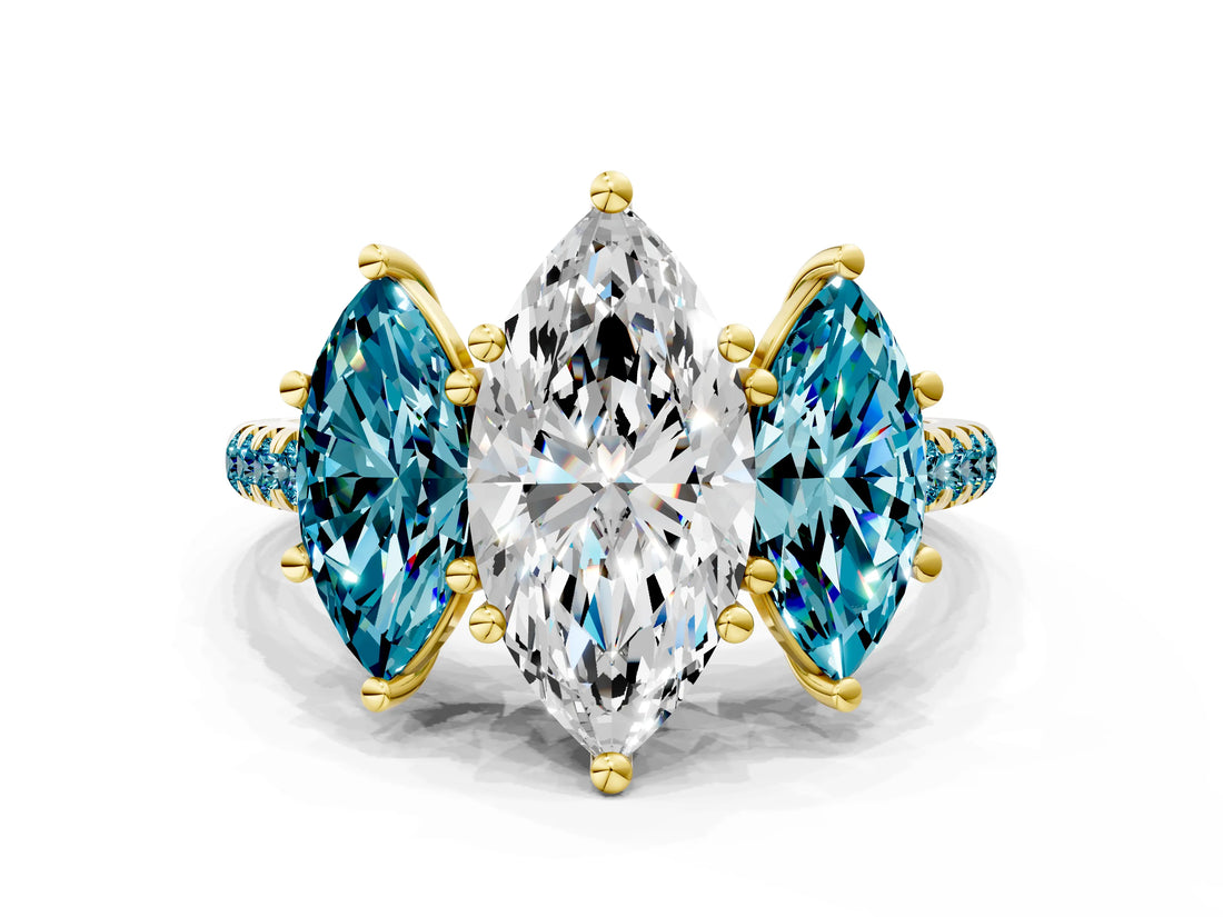 Yellow gold Three-Stone Marquise Cut Diamond Ring with Round with Blue Topaz side stone Pavé Band and Prong Setting