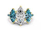Yellow gold Three-Stone Marquise Cut Diamond Ring with Round with Blue Topaz side stone Pavé Band and Prong Setting