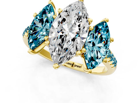 Yellow gold Three-Stone Marquise Cut Diamond Ring with Round with Blue Topaz side stone Pavé Band and Prong Setting_1