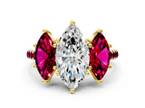 Yellow gold Three-Stone Marquise Cut Diamond Ring with Round with Garnet side stone Pavé Band and Prong Setting