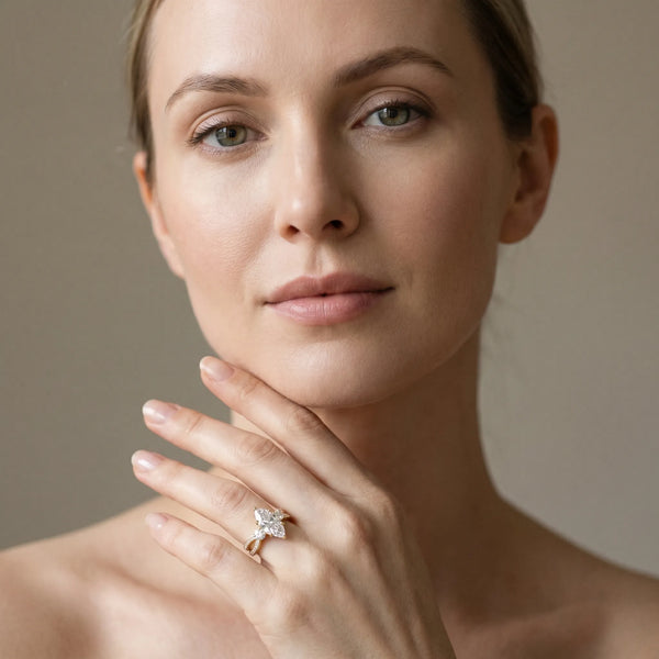 Yellow gold Three-Stone Marquise Cut Diamond Twist Band with Prong Setting