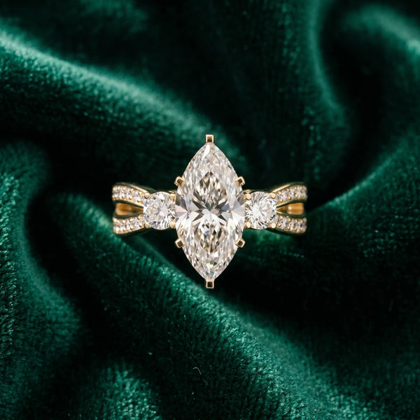 Yellow gold Three-Stone Marquise Cut Diamond Twist Band with Prong Setting