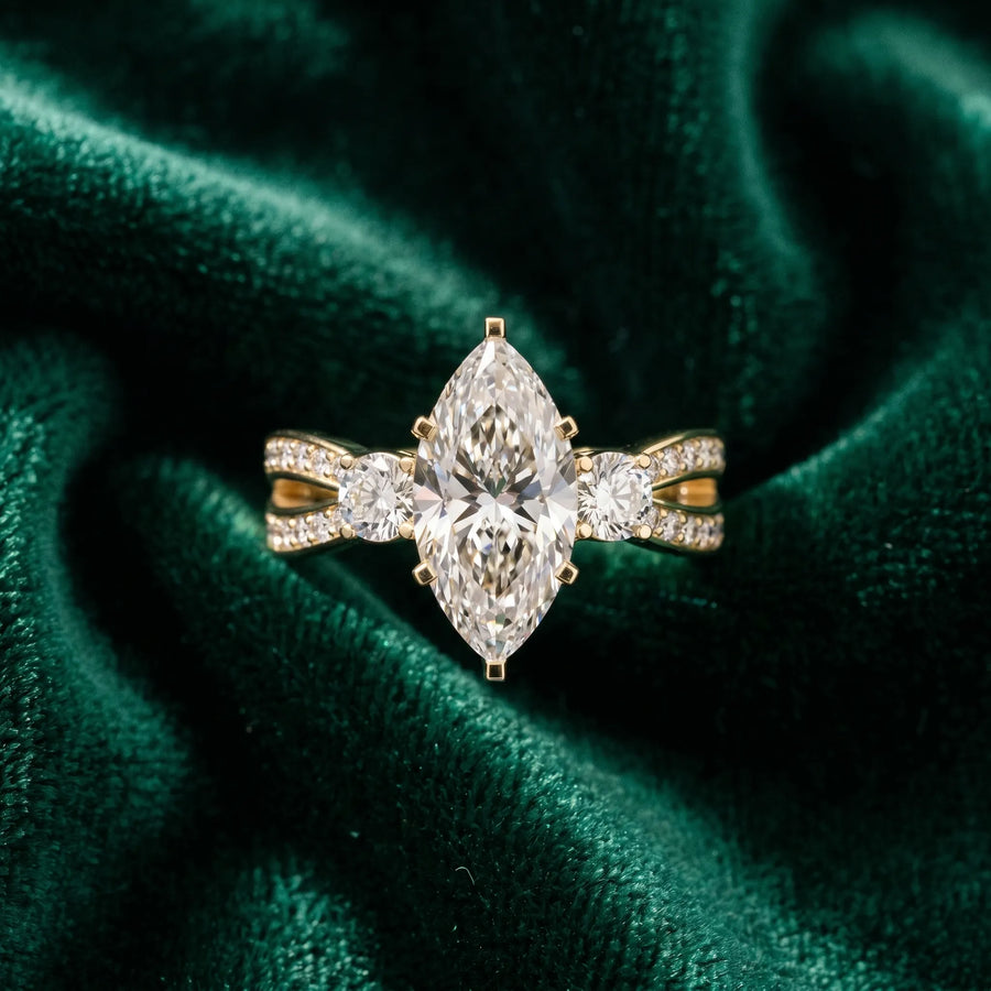 Yellow gold Three-Stone Marquise Cut Diamond Twist Band with Prong Setting