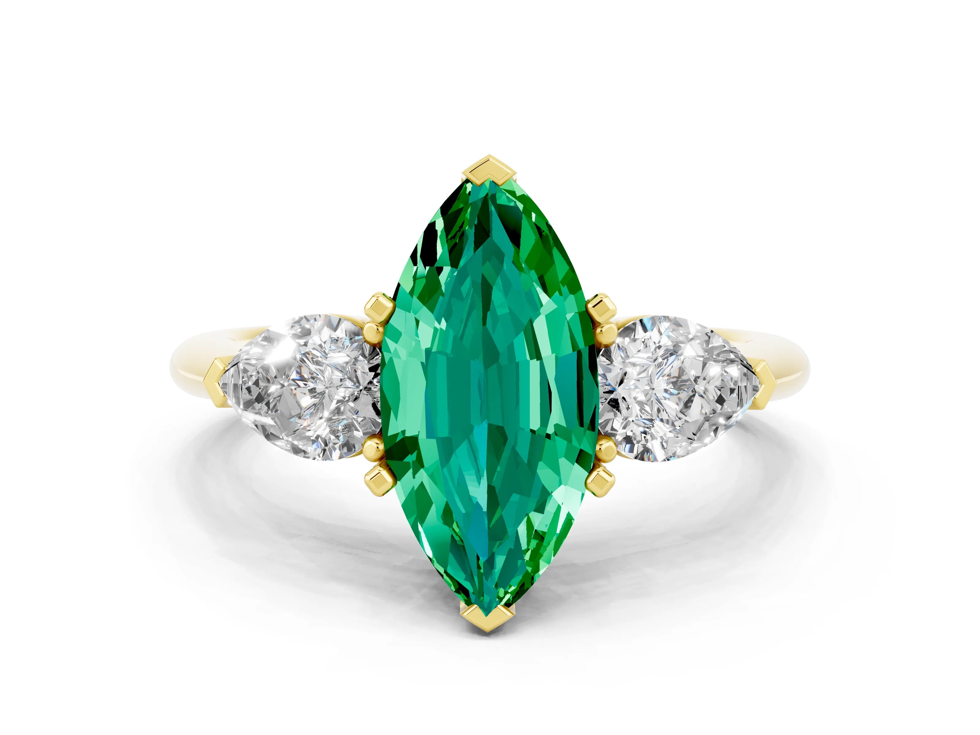 Yellow gold Three-Stone Marquise Cut Emerald Ring with Pear Side Stones and Four-Prong Setting