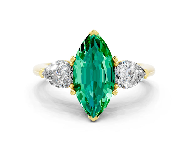 Yellow gold Three-Stone Marquise Cut Emerald Ring with Pear Side Stones and Four-Prong Setting