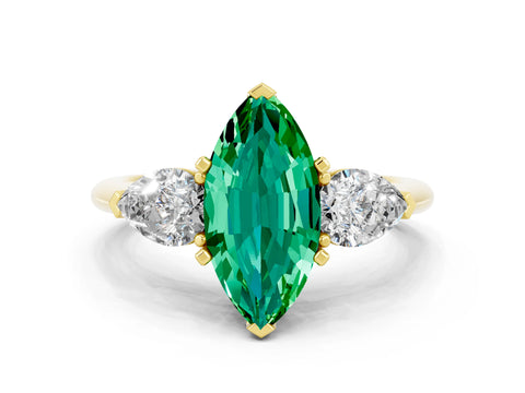 Yellow gold Three-Stone Marquise Cut Emerald Ring with Pear Side Stones and Four-Prong Setting