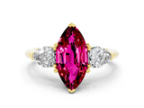 Yellow gold Three-Stone Marquise Cut Garnet Ring with Pear Side Stones and Four-Prong Setting