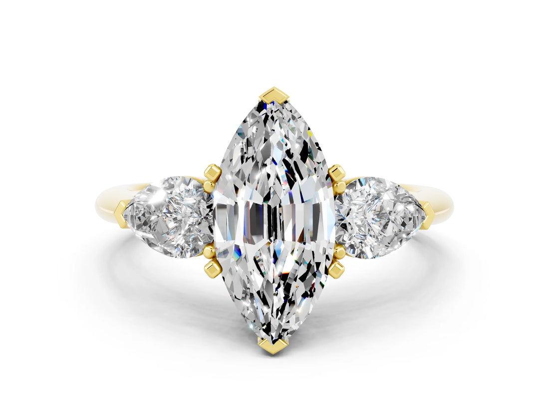Yellow gold Three-Stone Marquise Cut Moissanite Ring with Pear Side Stones and Four-Prong Setting