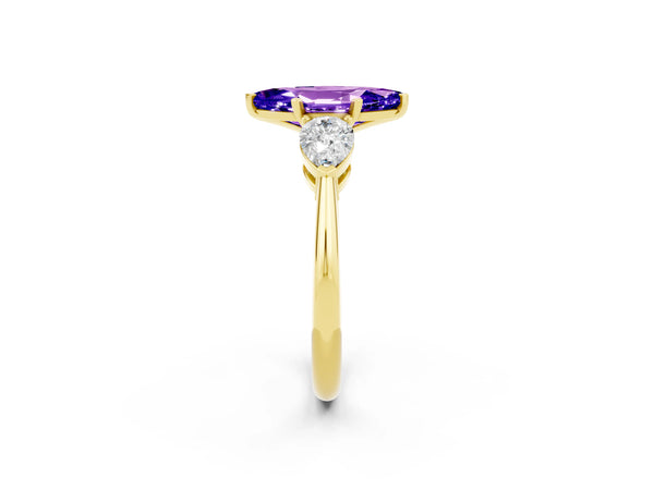 Yellow gold Three-Stone Marquise Cut Tanzanite Ring with Pear Side Stones and Four-Prong Setting