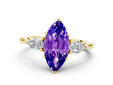 Yellow gold Three-Stone Marquise Cut Tanzanite Ring with Pear  Side Stones in Four-Prong Setting_12