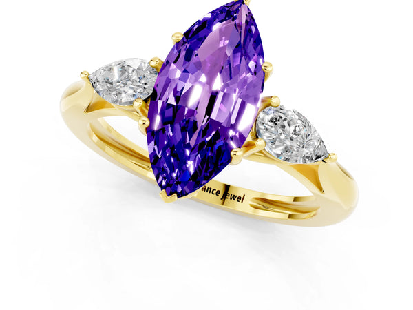 Yellow gold Three-Stone Marquise Cut Tanzanite Ring with Pear  Side Stones in Four-Prong Setting