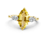 Yellow gold Three-Stone Marquise Cut Yellow Sapphire Ring with Pear  Side Stones in Four-Prong Setting_36