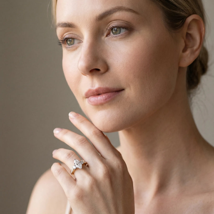 Yellow gold Three-Stone Marquise Diamond Channel Set Engagement Ring with Prong Setting