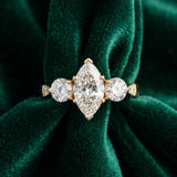 Yellow gold Three-Stone Marquise Diamond Engagement Ring with Prong Setting on a Classic Band_6