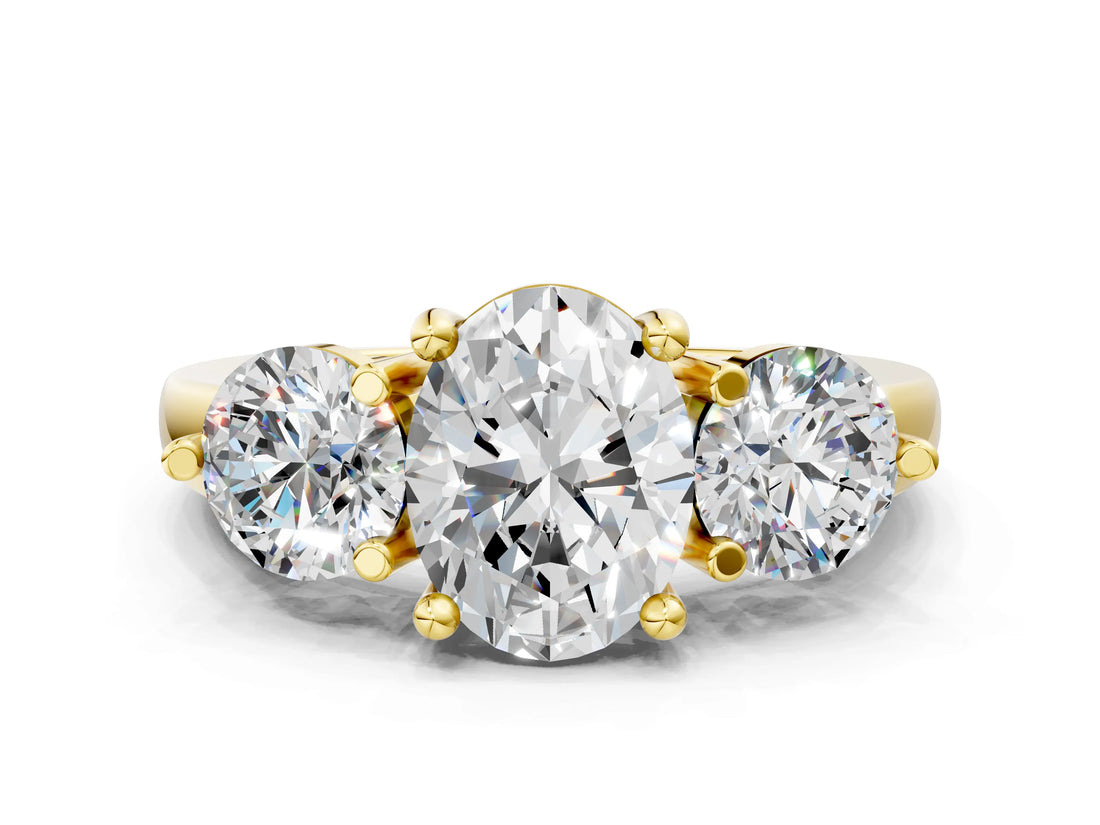 Yellow gold Three-Stone Oval Brilliant Cut Solitaire Ring with Prong Setting on a Classic Band