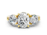 Yellow gold Three-Stone Oval Brilliant Cut Solitaire Ring with Prong Setting on a Classic Band