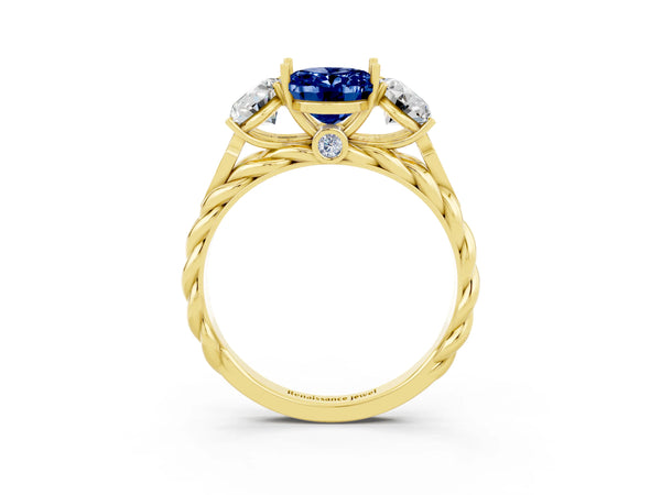 Yellow gold Three-Stone Oval Cut Blue Sapphire Braided Band Ring with Four-Prong Setting