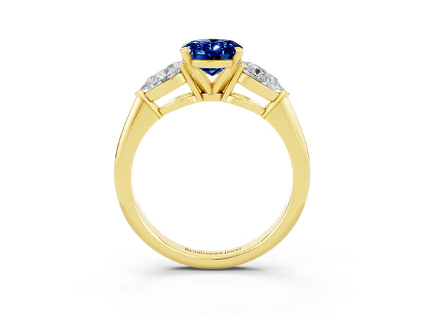 Yellow gold Three-Stone Oval Cut Blue Sapphire Ring with Pear Side Stones and Four-Prong Setting