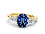 Yellow gold Three-Stone Oval Cut Blue Sapphire Ring with Pear  Side Stones in Four-Prong Setting_36
