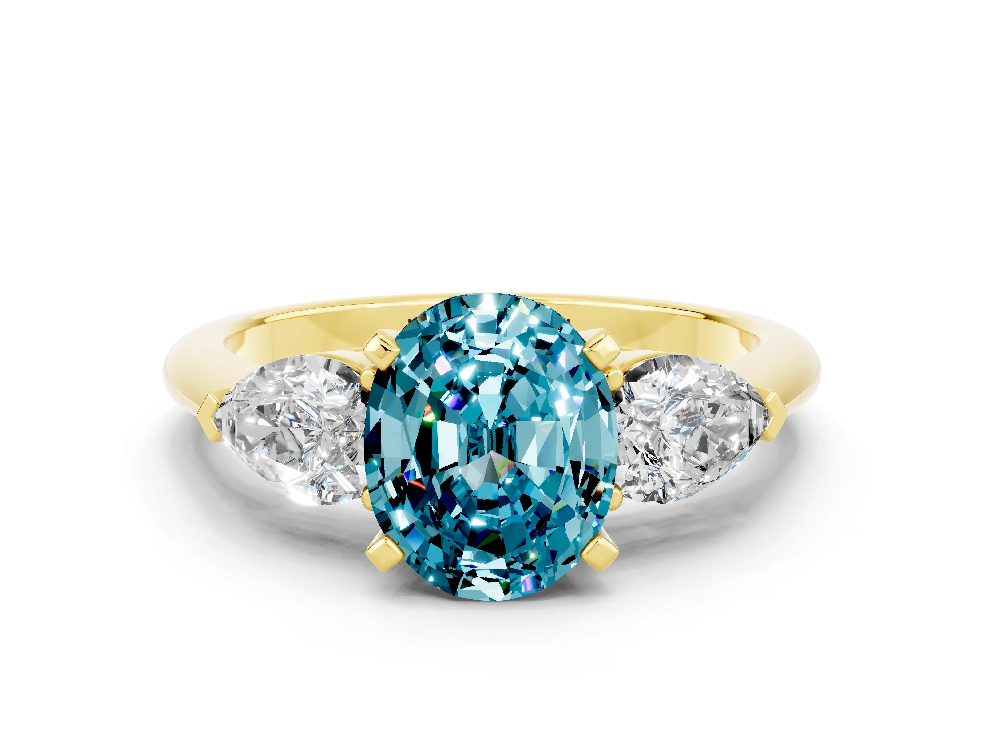 Yellow gold Three-Stone Oval Cut Blue Topaz Ring with Pear Side Stones and Four-Prong Setting