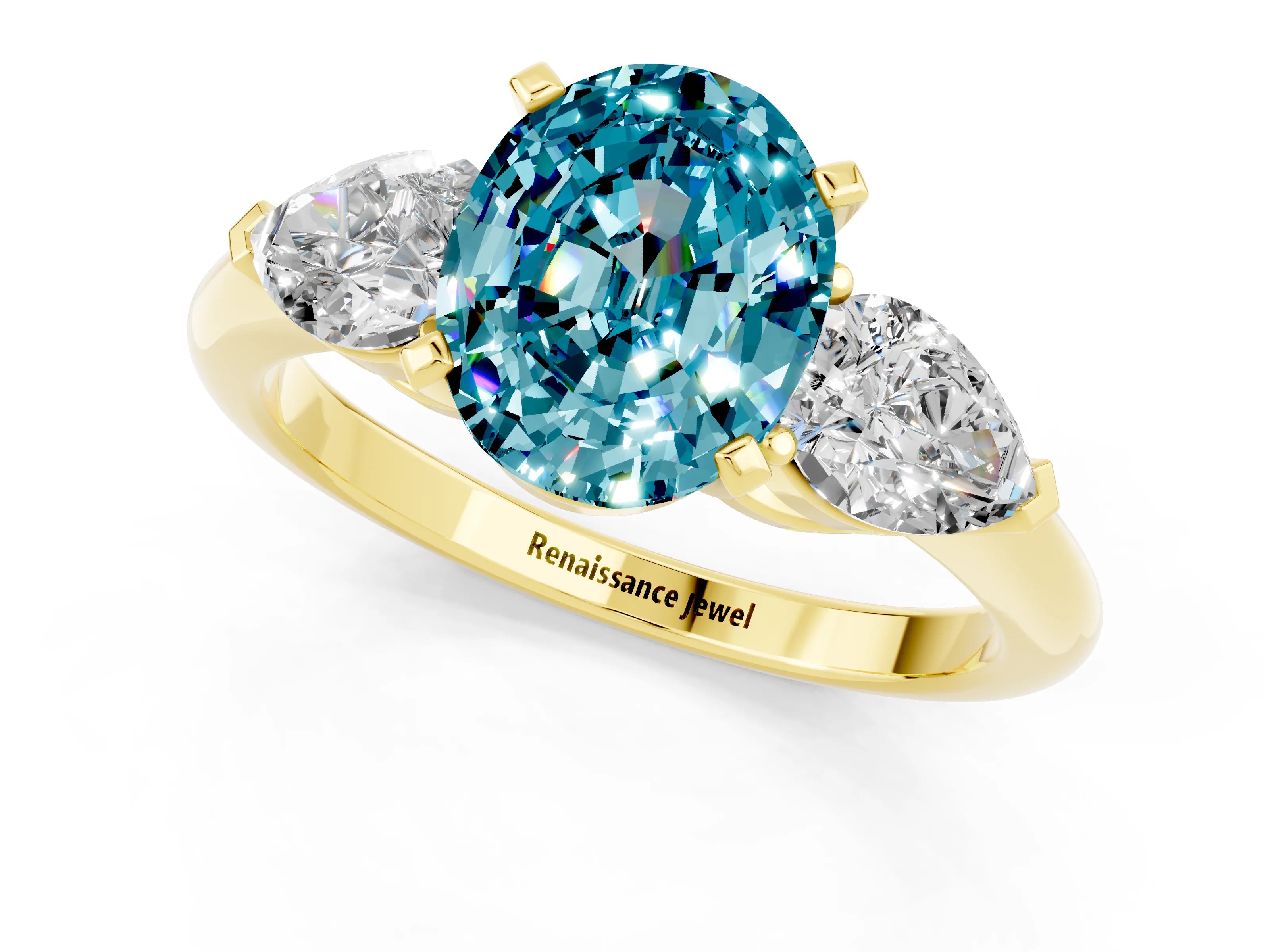 Yellow gold Three-Stone Oval Cut Blue Topaz Ring with Pear Side Stones and Four-Prong Setting_1