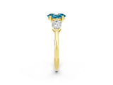 Yellow gold Three-Stone Oval Cut Blue Topaz Ring with Pear Side Stones and Four-Prong Setting_2