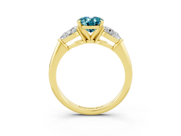 Yellow gold Three-Stone Oval Cut Blue Topaz Ring with Pear Side Stones and Four-Prong Setting