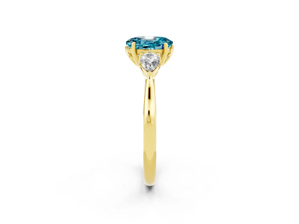 Yellow gold Three-Stone Oval Cut Blue Topaz Ring with Pear  Side Stones in Four-Prong Setting
