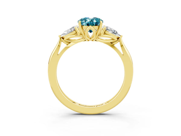 Yellow gold Three-Stone Oval Cut Blue Topaz Ring with Pear  Side Stones in Four-Prong Setting