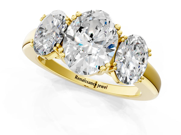 Yellow gold Three-Stone Oval Cut Cut Diamond Ring with Channel Set Band and Four-Prong Setting