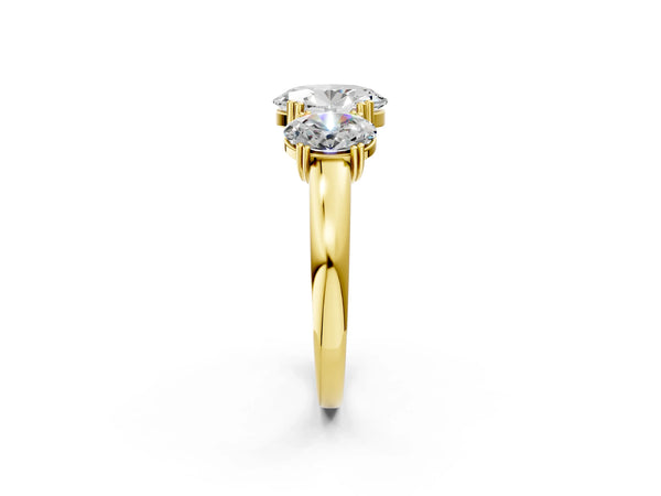 Yellow gold Three-Stone Oval Cut Cut Diamond Ring with Channel Set Band and Four-Prong Setting