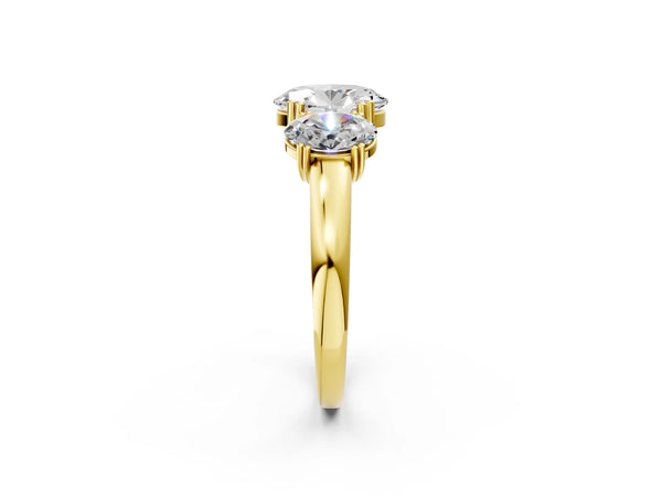 Yellow gold Three-Stone Oval Cut Cut Diamond Ring with Channel Set Band and Four-Prong Setting