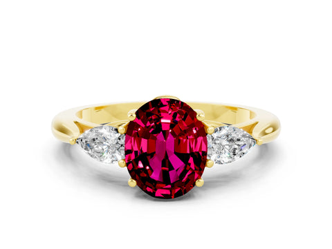 Yellow gold Three-Stone Oval Cut Cut Diamond Ring with Pear Side Stones in Four-Prong Setting