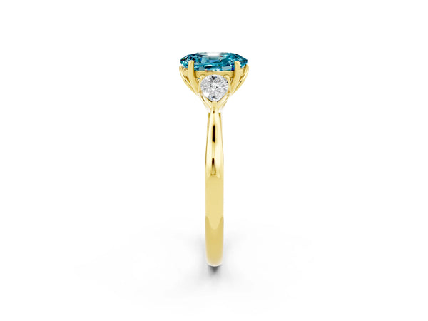 Yellow gold Three-Stone Oval Cut Cut Diamond Ring with Pear Side Stones in Four-Prong Setting