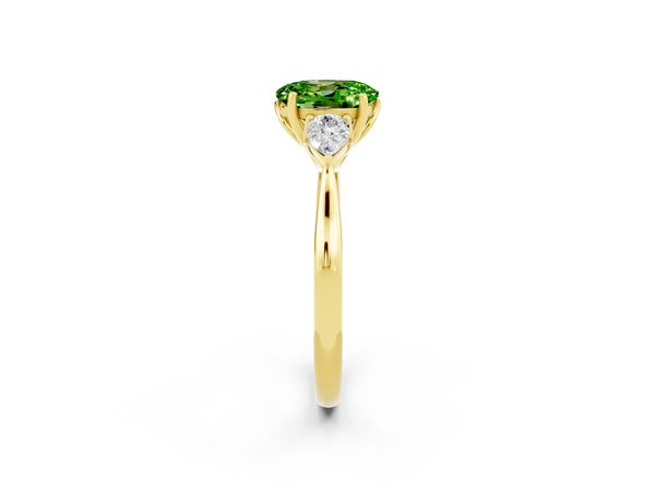Yellow gold Three-Stone Oval Cut Cut Diamond Ring with Pear Side Stones in Four-Prong Setting