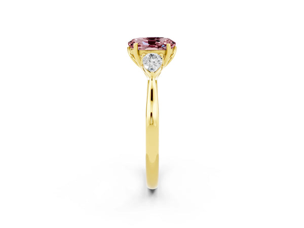 Yellow gold Three-Stone Oval Cut Cut Diamond Ring with Pear Side Stones in Four-Prong Setting